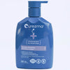 Blue bottle of Curezma Eczema Soothing Sensitive Lotion on a light purple background